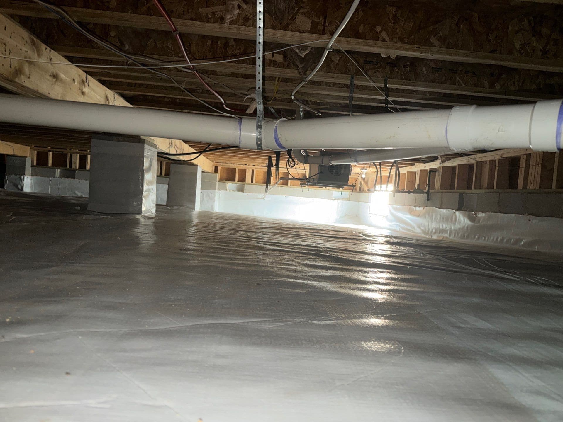 Superior Crawl Space Revamp with 20 Mil Woven Vapor Barrier image
