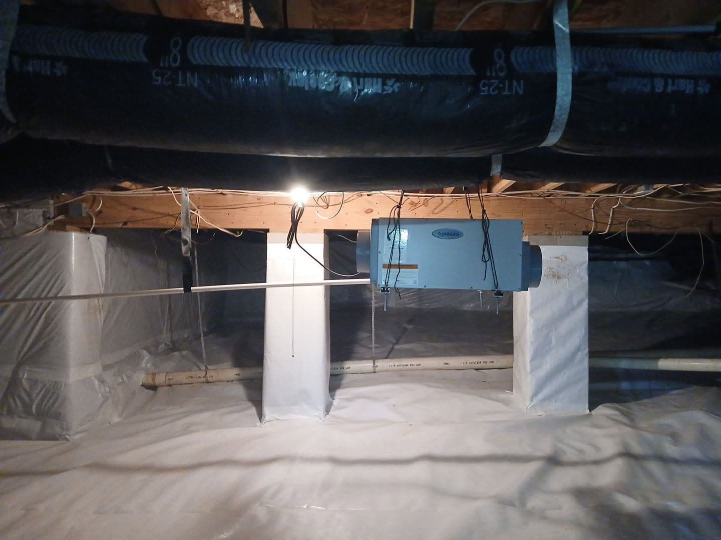 Insul-Barrier Wrap and Dehumidifier Setup for a Dry Crawl Space image